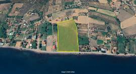 Very Large Coastal Land Field in a famous Resort in Greece, EU.